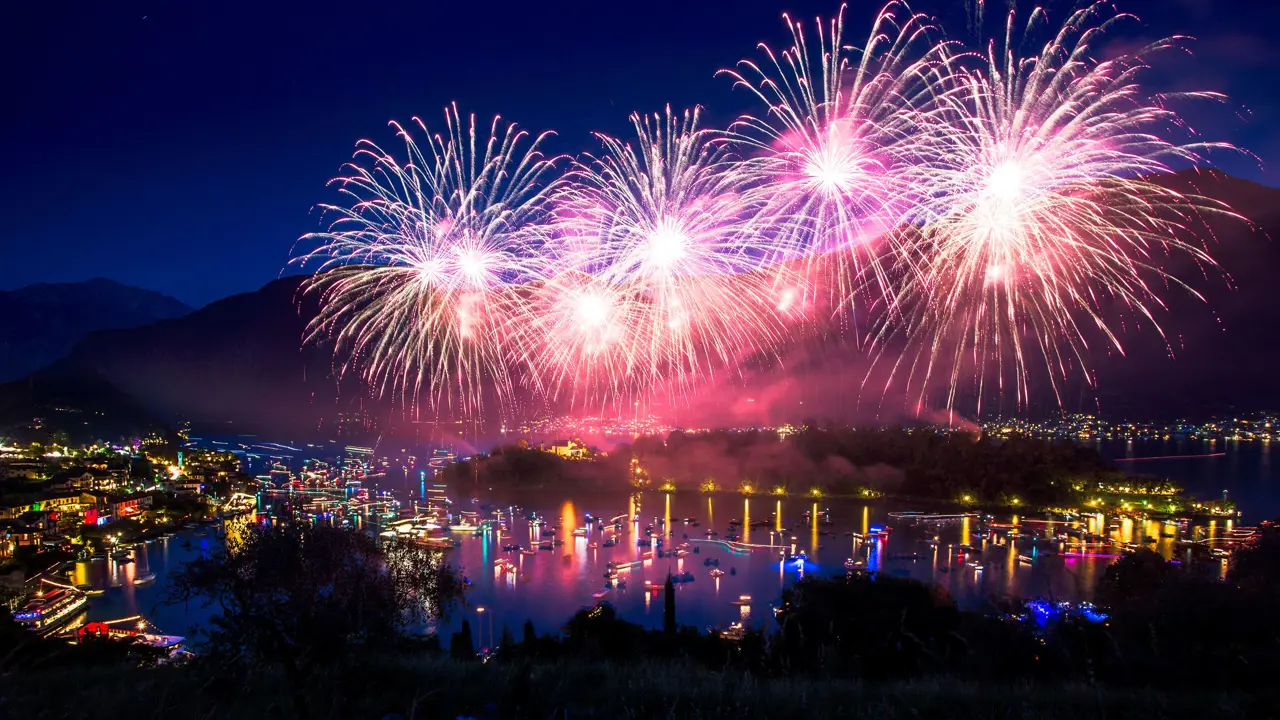 Pink fireworks in Lake Como on New Years Eve